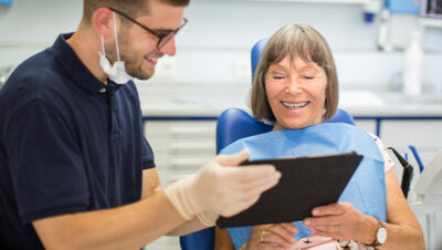 dentist speaking with patient