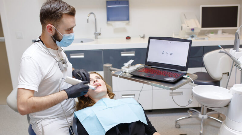 dentist scanning patient